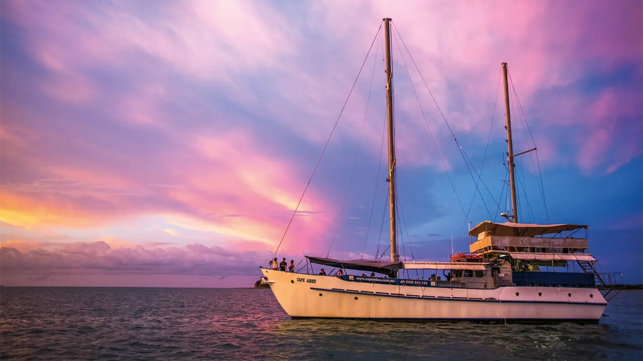 Boat at sunset for travel section, Darwin